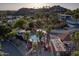 Stunning aerial view showcasing the pool, community amenities, and the desert landscape at 1808 E Hayward Ave # 1, Phoenix, AZ 85020