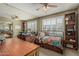 Bedroom has an open feel with a ceiling fan, a daybed and lots of natural light at 1808 E Hayward Ave # 1, Phoenix, AZ 85020
