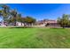 Expansive grassy common area perfect for outdoor activities, and enjoying the community at 1808 E Hayward Ave # 1, Phoenix, AZ 85020