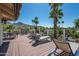Relaxing deck with stunning views, palm trees, and comfortable lounge seating at 1808 E Hayward Ave # 1, Phoenix, AZ 85020
