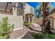 Beautiful home featuring desert landscaping, stucco walls, and a cozy pergola-covered entryway at 1808 E Hayward Ave # 1, Phoenix, AZ 85020