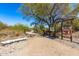 Scenic hiking trail entrance featuring a map, information, and bench surrounded by native desert flora at 1808 E Hayward Ave # 1, Phoenix, AZ 85020