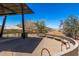Comfortable outdoor seating area with benches and a scenic mountain view under a clear blue sky at 1808 E Hayward Ave # 1, Phoenix, AZ 85020