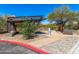 Inviting park shelter with shade structure, water fountain, and recycling bins, perfect for relaxing outdoors at 1808 E Hayward Ave # 1, Phoenix, AZ 85020