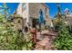 Charming brick patio with outdoor seating and mature landscaping at 1808 E Hayward Ave # 1, Phoenix, AZ 85020