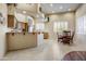 Well-lit kitchen featuring stainless steel appliances, light wood cabinets, and a cozy breakfast nook at 19115 E Buckskin Ct, Rio Verde, AZ 85263