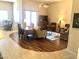 Inviting living room featuring an open floorplan, hardwood flooring, neutral paint colors and a ceiling fan at 19115 E Buckskin Ct, Rio Verde, AZ 85263