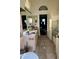 Modest bathroom featuring tile floors and a standard vanity at 19976 N 63Rd Dr, Glendale, AZ 85308