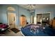 Primary bedroom featuring an ensuite bathroom, walk in closet and window at 19976 N 63Rd Dr, Glendale, AZ 85308