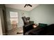 View of a bedroom with window and ceiling fan at 19976 N 63Rd Dr, Glendale, AZ 85308