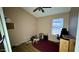 Bedroom with ceiling fan, wood laminate floors and a window for natural light at 19976 N 63Rd Dr, Glendale, AZ 85308
