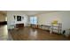 Spacious living room features wood flooring and a large window for natural light at 19976 N 63Rd Dr, Glendale, AZ 85308