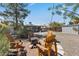 Outdoor fire pit area with Adirondack chairs and pea gravel landscaping at 2039 N 12Th St, Phoenix, AZ 85006