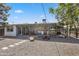 View of the backyard from the covered patio, featuring pea gravel at 2039 N 12Th St, Phoenix, AZ 85006