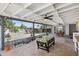 Cozy covered patio with fan, string lights, and ample seating at 2039 N 12Th St, Phoenix, AZ 85006