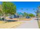 Shaded playground with benches on a sunny day at 2039 N 12Th St, Phoenix, AZ 85006