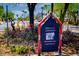 A beautiful street view of Coronado, with palm trees and colorful signs at 2039 N 12Th St, Phoenix, AZ 85006