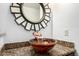 The artistic bowl sink with waterfall faucet enhances this bathroom's luxurious feel at 20801 N 90Th Pl # 210, Scottsdale, AZ 85255