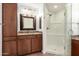 Attractive bathroom with a shower, granite counters, and framed mirrors at 20801 N 90Th Pl # 210, Scottsdale, AZ 85255