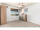 Cozy bedroom featuring carpet, a ceiling fan, and natural light at 20801 N 90Th Pl # 210, Scottsdale, AZ 85255