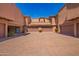 Attached garages and a paved parking area provide ample space for residents and guests at 20801 N 90Th Pl # 210, Scottsdale, AZ 85255