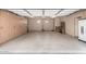Spacious garage equipped with ample storage cabinets and epoxy flooring at 20801 N 90Th Pl # 210, Scottsdale, AZ 85255