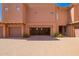 Attached garage provides convenient parking and additional storage space for homeowners at 20801 N 90Th Pl # 210, Scottsdale, AZ 85255