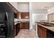 Well-equipped kitchen featuring granite countertops, stainless steel appliances, and ample cabinet space at 20801 N 90Th Pl # 210, Scottsdale, AZ 85255