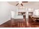 Open-concept living room and kitchen with sleek hardwood floors and plenty of natural light at 20801 N 90Th Pl # 210, Scottsdale, AZ 85255