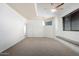 Large main bedroom with ceiling fan, bright natural light, and access to the en-suite bath at 20801 N 90Th Pl # 210, Scottsdale, AZ 85255