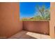 Private patio offers a secluded outdoor space with views of the surrounding greenery at 20801 N 90Th Pl # 210, Scottsdale, AZ 85255