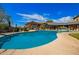 Inviting community pool area with ample seating, community buildings and beautiful landscaping at 20801 N 90Th Pl # 210, Scottsdale, AZ 85255