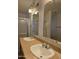 Bathroom view shows double sinks and mirrors at 2233 E Behrend Dr # 211, Phoenix, AZ 85024