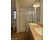 Bathroom features a double sink vanity and a walk-in shower at 2233 E Behrend Dr # 211, Phoenix, AZ 85024