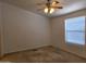 Bedroom showcases a ceiling fan and a window at 2233 E Behrend Dr # 211, Phoenix, AZ 85024