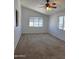 Spacious bedroom with plush carpet and natural light streaming through the windows at 2233 E Behrend Dr # 211, Phoenix, AZ 85024