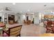 Spacious common area with open floor plan, multiple seating areas, and a kitchen at 2233 E Behrend Dr # 211, Phoenix, AZ 85024