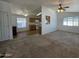 Bright and open living room with ceiling fan and an eat-in kitchen at 2233 E Behrend Dr # 211, Phoenix, AZ 85024