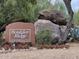 Community sign for Boulder Ridge at 2233 Behrend Dr. surrounded by foliage at 2233 E Behrend Dr # 211, Phoenix, AZ 85024