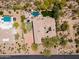 Beautiful home featuring a sparkling pool, putting green, basketball court, desert landscaping, and mature trees at 22469 N 79Th Pl, Scottsdale, AZ 85255