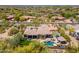 Beautiful desert home with a pool, outdoor seating, putting green, and desert landscaping at 22469 N 79Th Pl, Scottsdale, AZ 85255