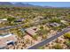 Desert home featuring a pool, lush landscaping, and views of the serene desert surroundings at 22469 N 79Th Pl, Scottsdale, AZ 85255