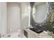 Sleek bathroom features stone accent wall, vessel sink and pendant lighting at 22469 N 79Th Pl, Scottsdale, AZ 85255