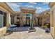 Charming courtyard featuring a seating area, unique desert plants and stone accents at 22469 N 79Th Pl, Scottsdale, AZ 85255