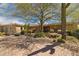 Well maintained desert home with brick driveway and lush desert landscaping at 22469 N 79Th Pl, Scottsdale, AZ 85255