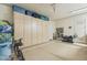 Spacious garage with a large wall-mounted storage cabinet to help organize all your personal items at 22469 N 79Th Pl, Scottsdale, AZ 85255