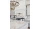 Close-up of the range and countertops in a gourmet kitchen with custom hood at 22469 N 79Th Pl, Scottsdale, AZ 85255