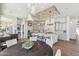 Open kitchen and dining with elegant chandeliers, stainless appliances and breakfast bar at 22469 N 79Th Pl, Scottsdale, AZ 85255