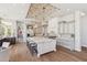 Spacious kitchen with a marble island, stainless steel refrigerator, and beautiful chandeliers at 22469 N 79Th Pl, Scottsdale, AZ 85255