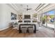 Bright living room with fireplace, built-in shelves, and natural light at 22469 N 79Th Pl, Scottsdale, AZ 85255